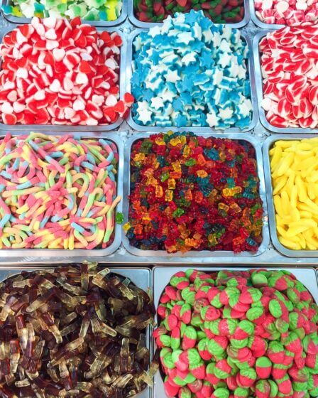 assorted candies in plastic containers